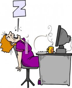 0511-1107-2914-1722_Tired_worker_asleep_on_the_job_in_front_of_the_computer_clipart_image